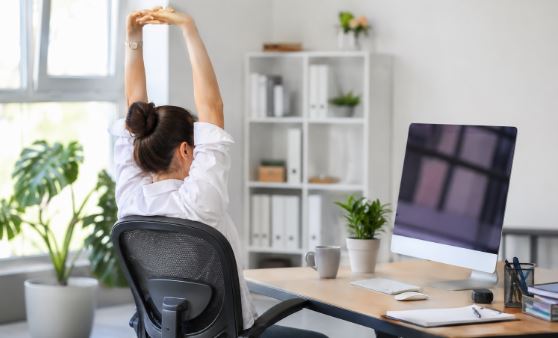 Office workers practicing healthy workplace wellness habits by Morningsun